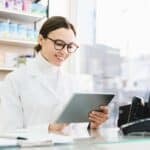 pharmacist checking data