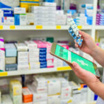 pharmacist using pharmacy software