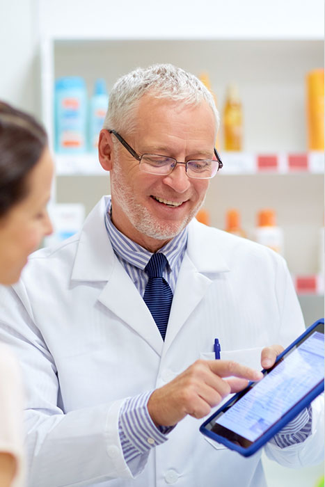 doctor holding tablet