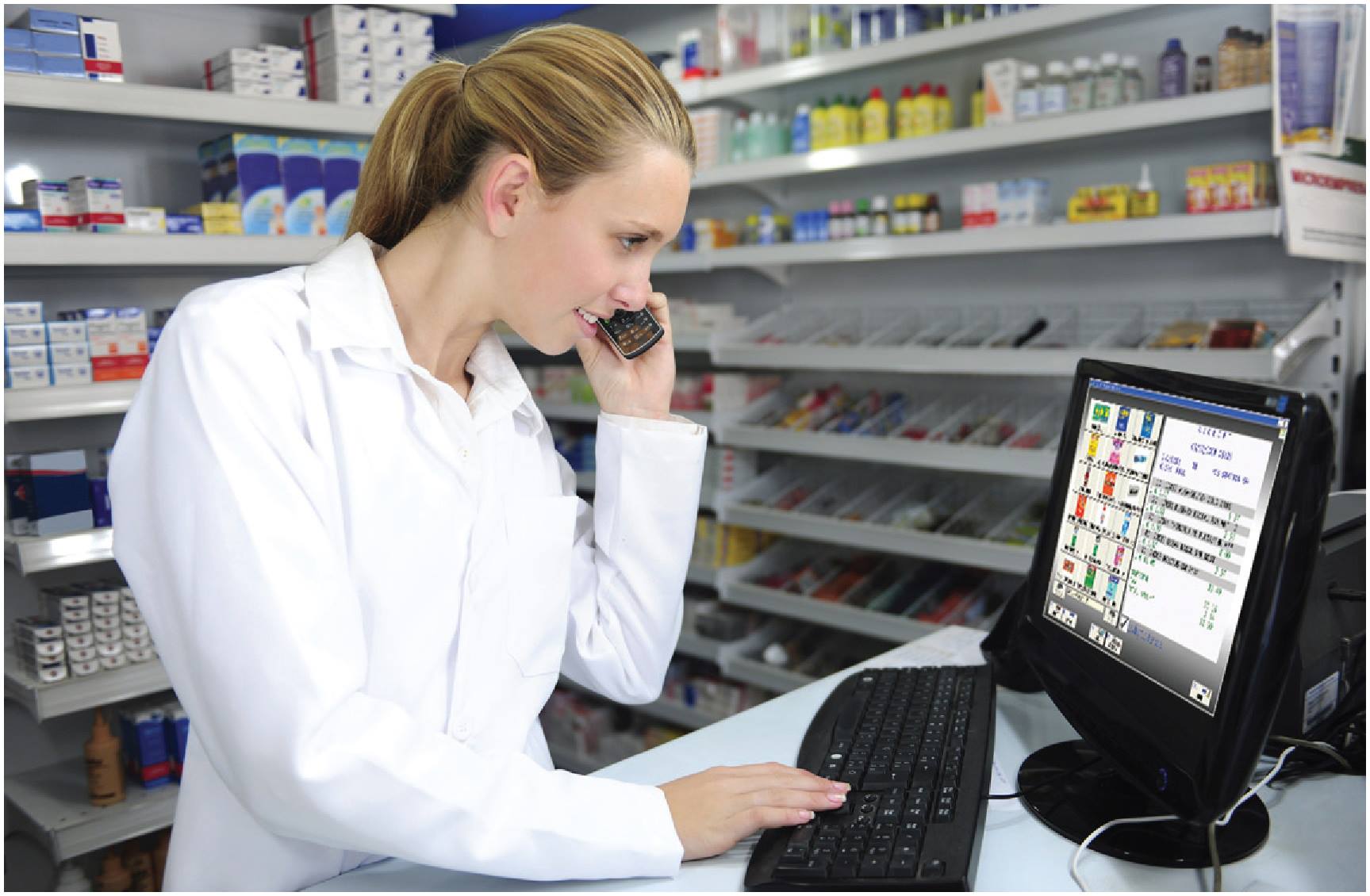 A pharmacist on the phone with software support